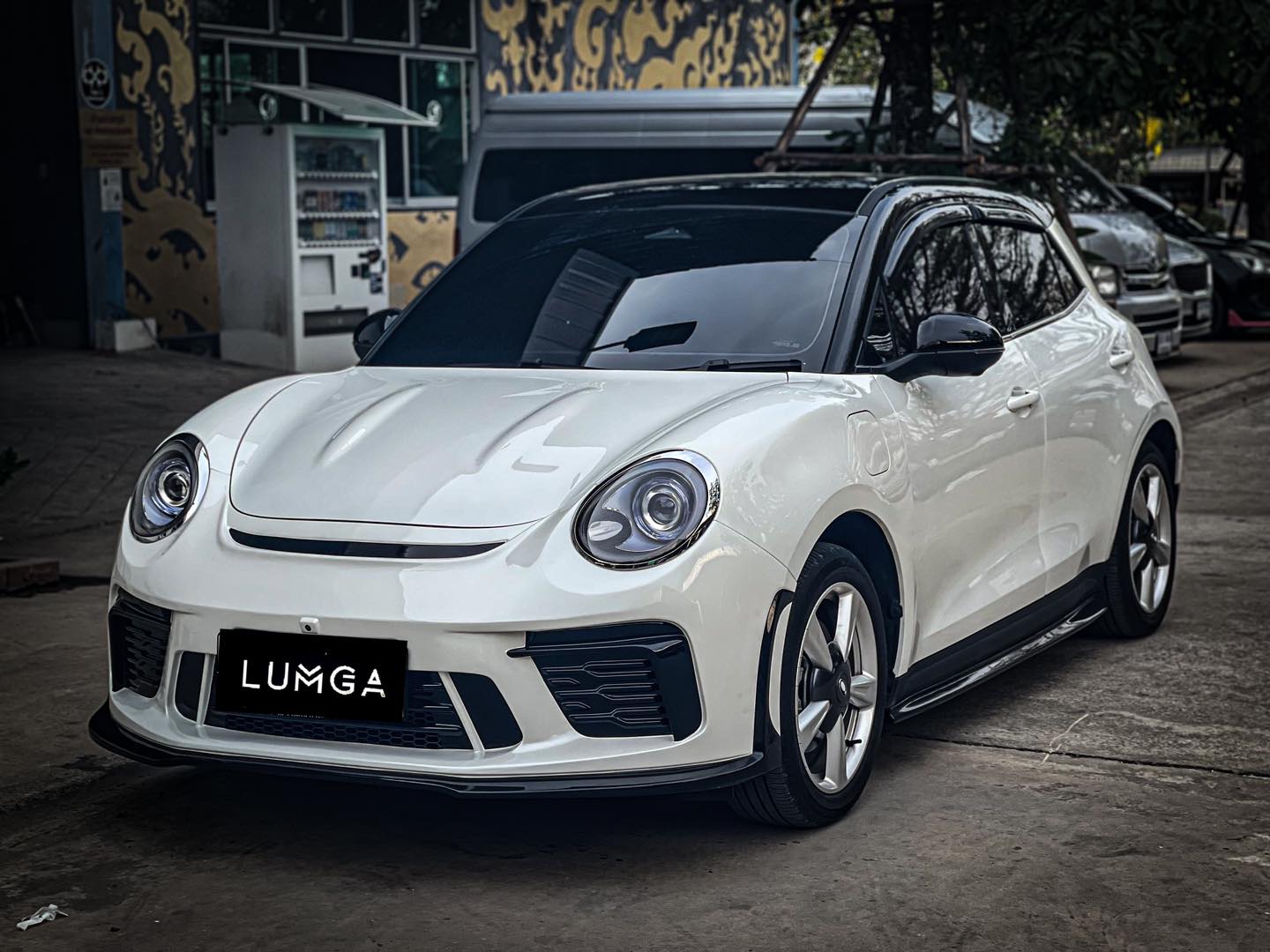 automotive LUMGA custom body skirt kit designed for Ora Good Cat by GWM