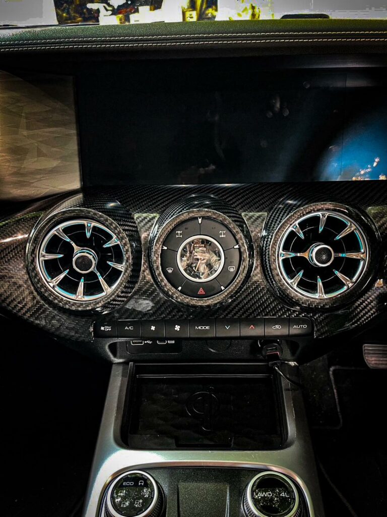 Reflective surface highlights luxury automotive design.