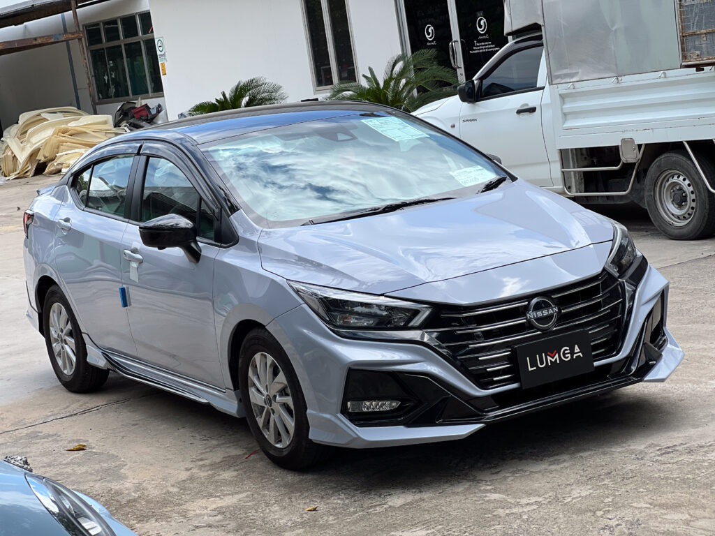 Nissan Almera with Lumga bodykit in sport design parked outdoors